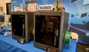 Open Sauce's Eye-catching Creations? Meet Elegoo's AI Robots, Glowing Cosplay Wings, and More, All 3D Printed