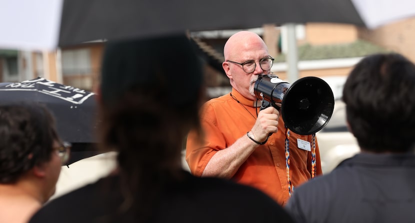 Reverend Eric Folkerth, senior pastor at the Kessler Park UMC, shares his message to a large...
