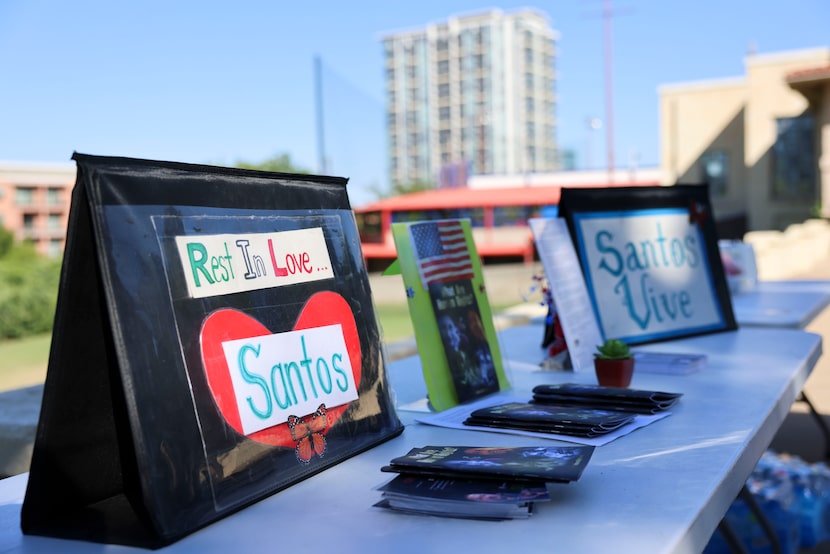 Signs and posters remain during a memorial gathering for Santos Rodriguez by the city of...