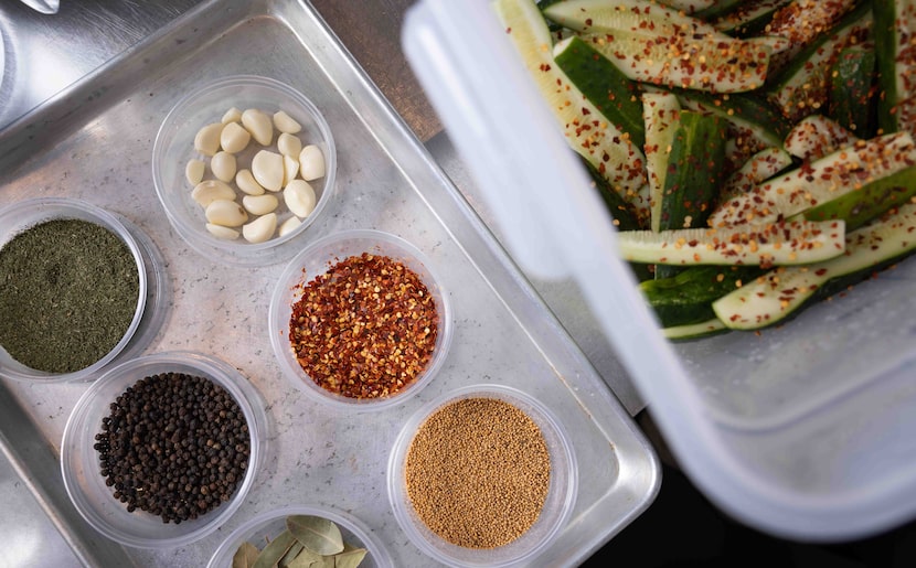 Garlic, crushed red chilies, mustard seeds, dried dill, peppercorn and bay leaf used to...
