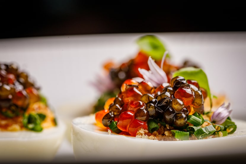 The Mont's deviled eggs come with shallot, bread crumb, chive, caviar and smoked roe.
