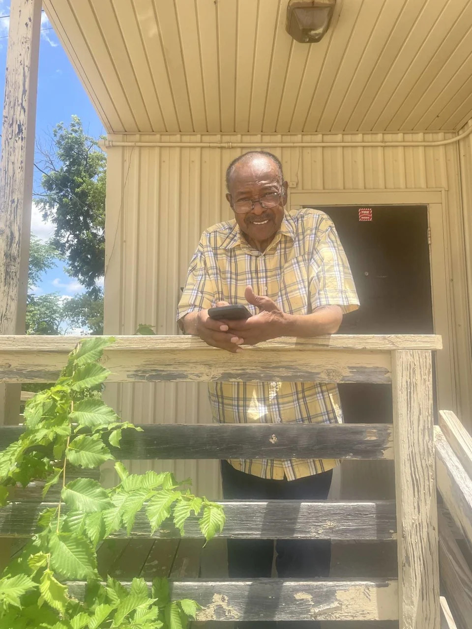 
Former Fort Worth City Councilman Frank Moss on the porch of the former Sagamore Hill Negro School, which he and his brothers attended when public schools were  racially segregated.  The building, which is the size of a portable classroom, is on the grounds of the Dunbar Young Men’s Leadership Academy at 5100 Willie St., the exact spot where the original wood frame schoolhouse was constructed in 1924. 