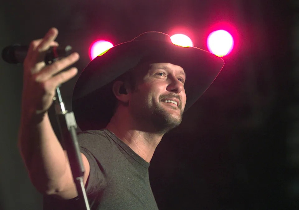 Tim McGraw takes the stage at the George Strait Country Music Festival in Altell Stadium in Jacksonville on May 15, 2000.