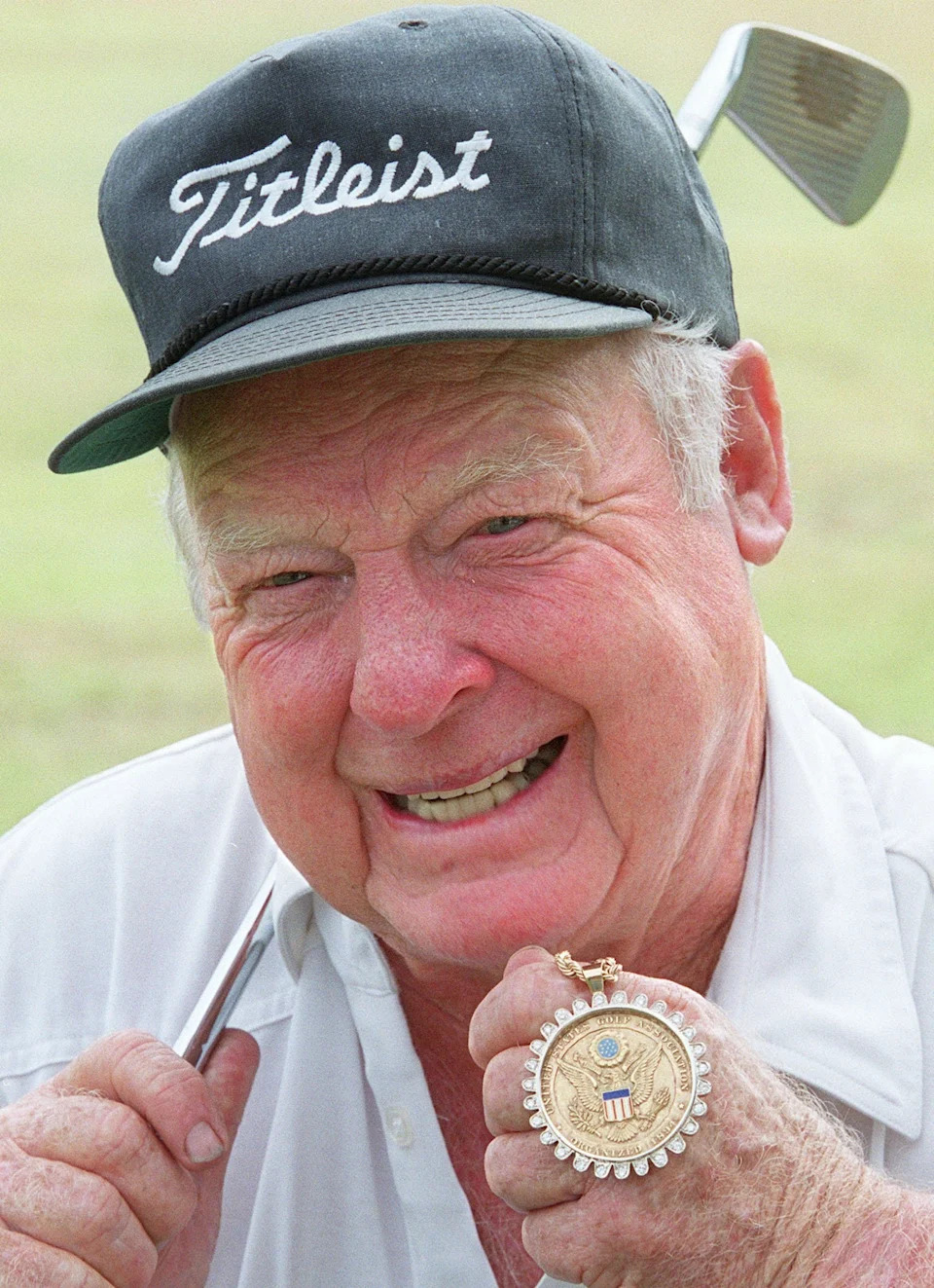 Billy Maxwell, holding the medal he won in 1951 for the U. S. Amateur golf championship, owned the Hyde Park Golf Club with partner Chris Blocker from 1971 to his passing in 2021.