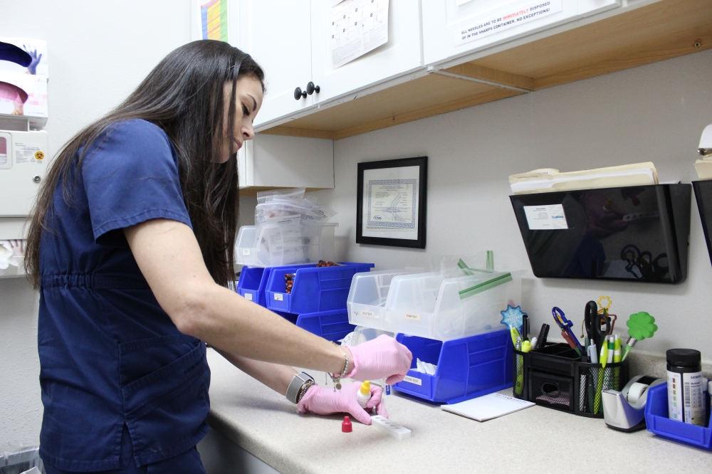 Melissa Herpel using a covid test