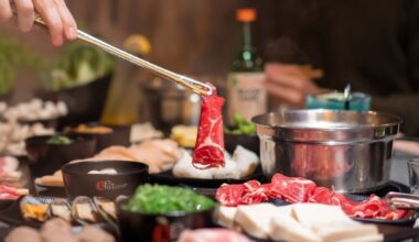 At KPot Korean BBQ & Hot Pot, indivduals use grills to cook ingredients before putting them into a pot of simmering soup stock. (Courtesy KPot Korean BBQ & Hot Pot)
