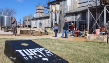 The outside lawn of Tupps Brewery featuring lawn games.