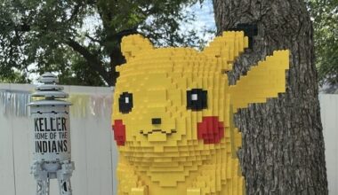 A Lego Pikachu sits next to a Lego Keller water tower.