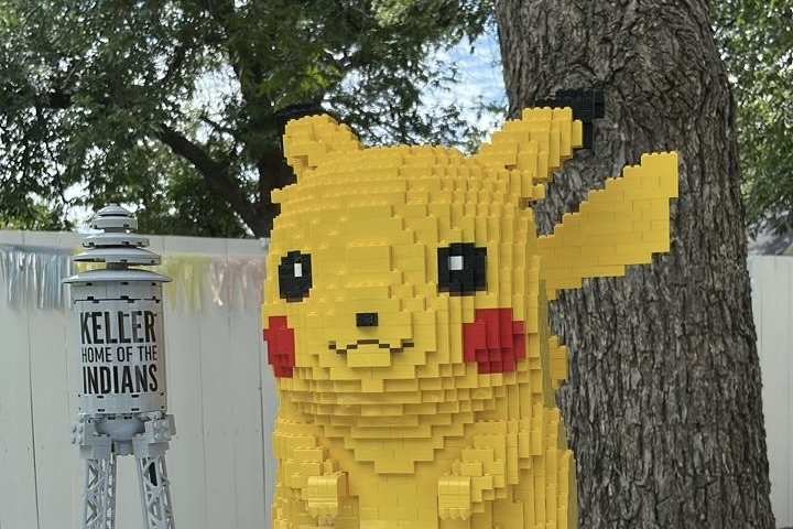 A Lego Pikachu sits next to a Lego Keller water tower.