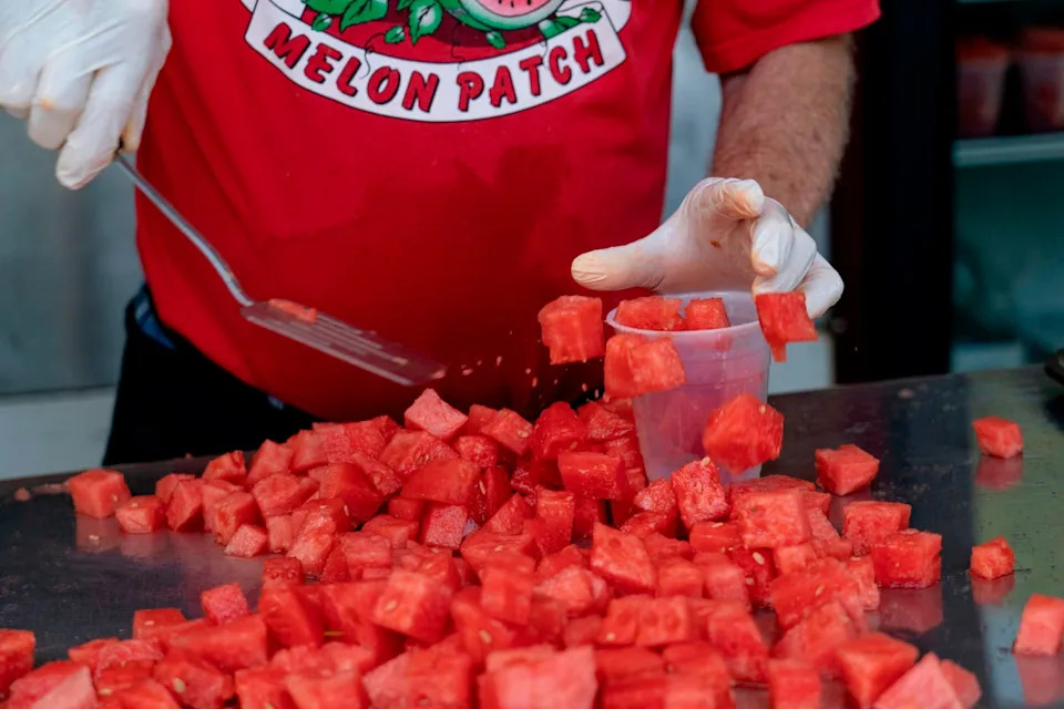 Eating a piece watermelon may provide relief on a sweltering summer day. But, experts say less is more (AFP/Getty)