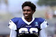 Dallas Cowboys cornerback DaRon Bland (26) heads to the locker room following training camp...