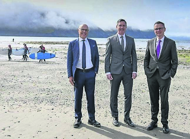 David McCourt and TJ Malone of National Broadband Ireland with culture minister Patrick O’Donovan on Keel Beach, Achill Island. 	 Picture: Michael McLaughlin
                    