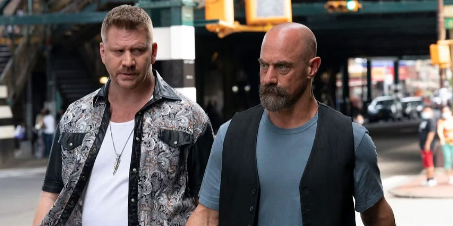 Law & Order: Organized Crime Stabler and Reggie walk down a busy NYC street.