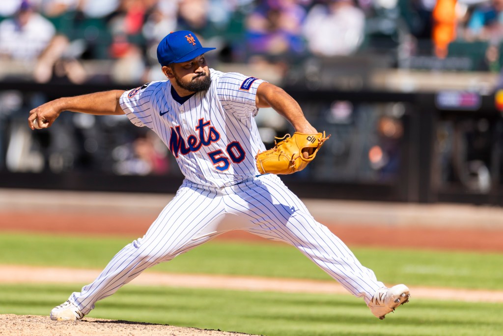 Rico Garcia #50 of the New York Mets throws a pitch in the eighth inning at Citi Field, Sunday, July 6, 2025, in Queens, NY.