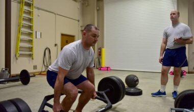U.S. Air Force Staff Sgt. Caine Nielsen, 19th Civil Engineer Squadron Explosive Ordnance Disposal NCO in charge of EOD equipment, performs the trap-bar deadlift at Little Rock Air Force Base, Arkansas.