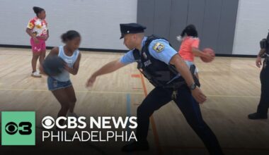 Philadelphia officers, activists join forces at "Peace Not Guns" basketball game