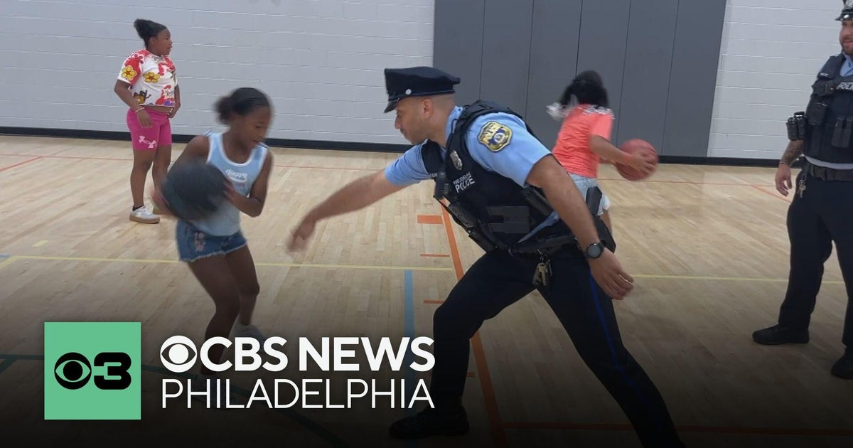 Philadelphia officers, activists join forces at "Peace Not Guns" basketball game