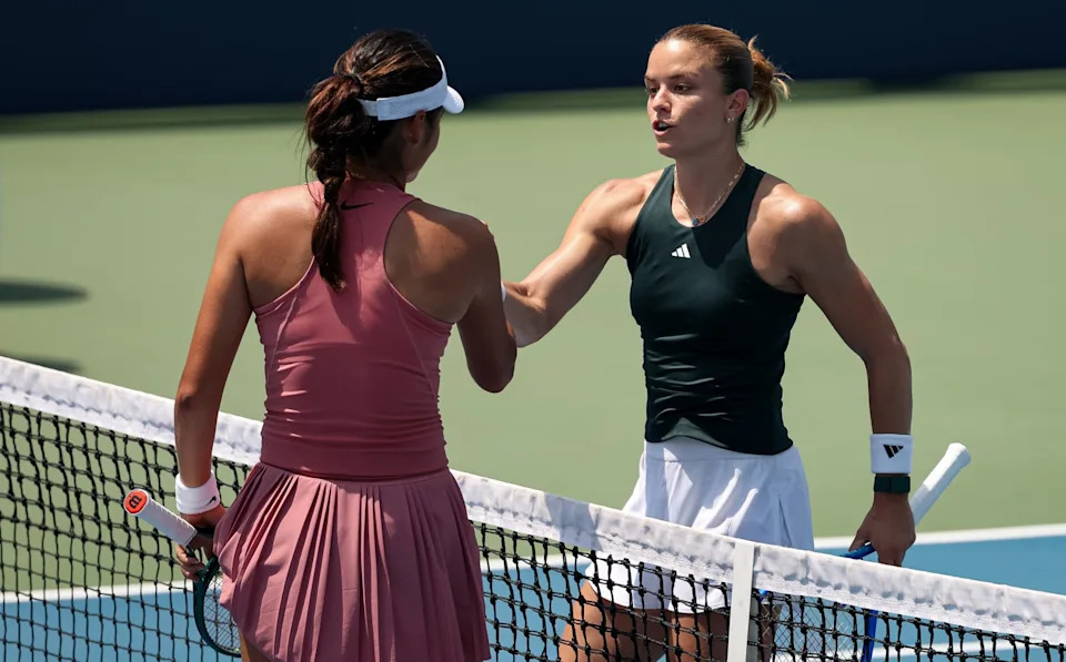 Emma Raducanu shakes hands with Maria Sakkari at the end of their match in Washington