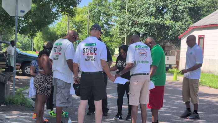 MAD DADS canvass neighborhood looking for answers about murder of Jacksonville grandmother