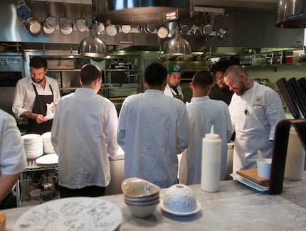 In this DMN file photo at Cafe Momentum, chefs prepare for dinner service. The majority of...