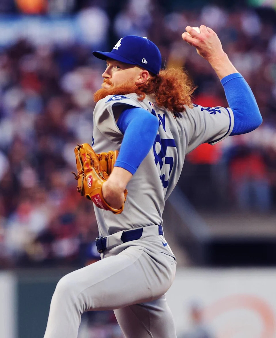 Dodgers pitcher Dustin May delivers against the Giants on Friday.