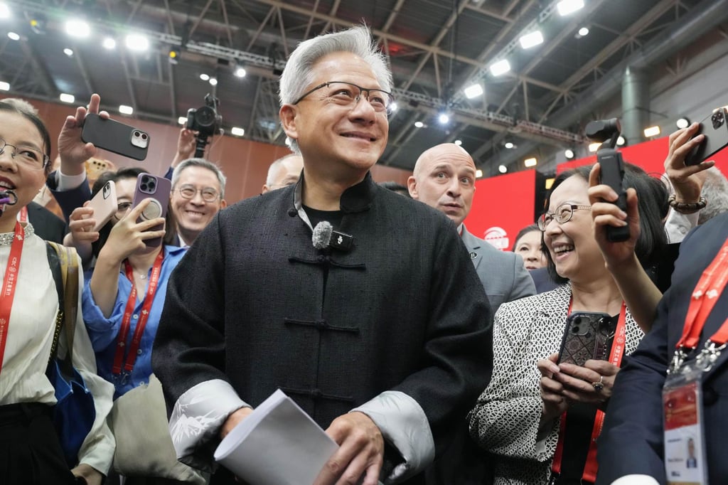Nvidia CEO Jensen Huang, donning a traditional Chinese Tang jacket, attends the China International Supply Chain Expo in Beijing on Wednesday. Photo: Kyodo