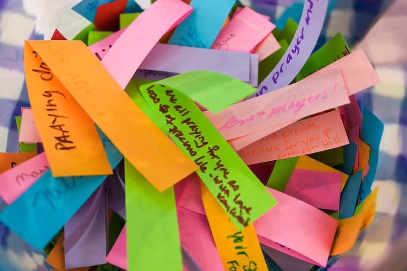 Prayer strips for Lila Bonner’s family fill a jar after a vigil for victims of Hill Country ...