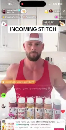 Man in sleeveless shirt stands behind a row of spice bottles during live broadcast, interacting with viewers' comments on-screen