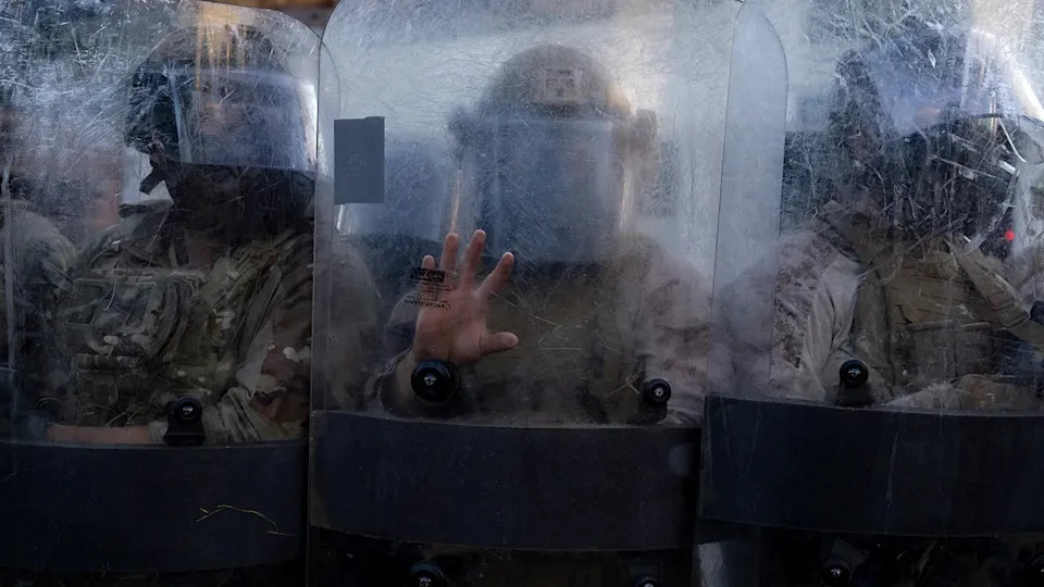 National Guard line their shields in LA