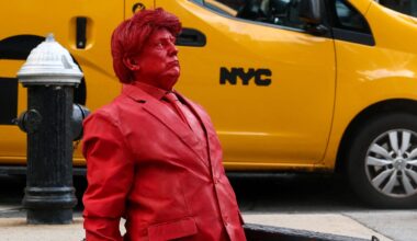 Video shows red sculpture of Donald Trump emerge from a NYC manhole