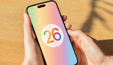 iOS 26 logo on a phone display