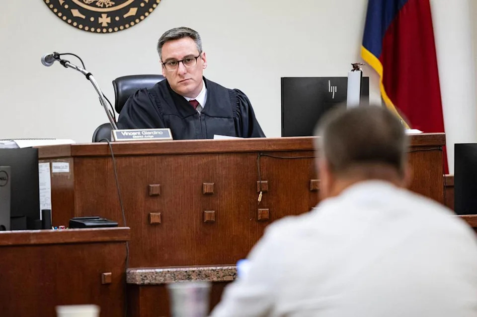 District Judge Vincent Giardino listens to the defense attorneys during the capital murder trial of Jacoby Roberts in the 369th District Court at the Tim Curry Criminal Justice Center in Fort Worth on Thursday, July 24. Roberts shot to death his cousin Jailon Freeman.