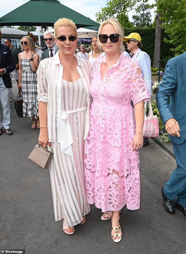 Rebel Wilson, 45, was all smiles as she she struck a pose with wife Ramona Agruma, 40, who looked chic in a white striped co-ord