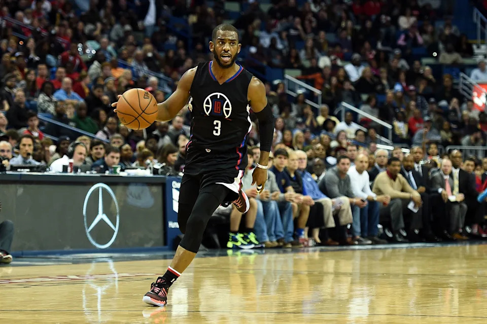 NEW ORLEANS, LA - DECEMBER 31:  Chris Paul #3 of the Los Angeles Clippers handles the ball during a game against the New Orleans Pelicans at the Smoothie King Center on December 31, 2015 in New Orleans, Louisiana. Los Angeles won the game 95-89. NOTE TO USER: User expressly acknowledges and agrees that, by downloading and or using this photograph, User is consenting to the terms and conditions of the Getty Images License Agreement.  (Photo by Stacy Revere/Getty Images)