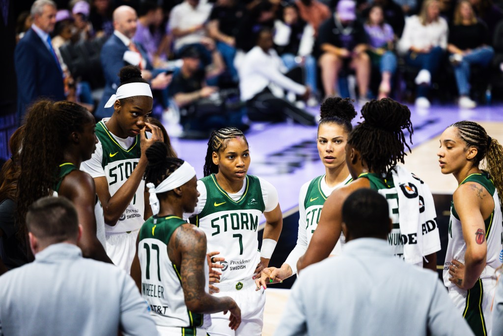 Seattle Storm guard Zia Cooke stands in a the middle of a team huddle during a game against the Golden State Valkyries on June 14, 2025, at Chase Center in San Francisco, Calif.