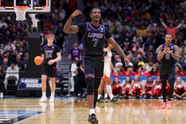 Grand Canyon guard Tyon Grant-Foster (7) reacts after a buzzer beater 3-point basket against Maryland during the first half in the first round of the NCAA college basketball tournament, Friday, March 21, 2025, in Seattle. (AP Photo/Ryan Sun)