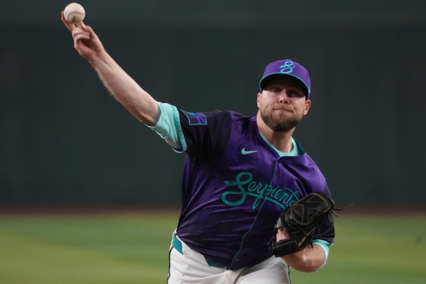 Arizona Diamondbacks pitcher Corbin Burnes throws against the Dodgers in the first inning during a baseball game, Saturday, May 10, 2025, in Phoenix. (AP Photo/Rick Scuteri)