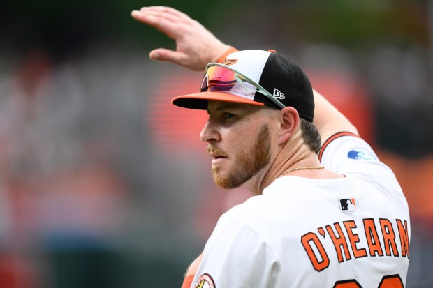 Baltimore Orioles' Ryan O'Hearn waves as he was recognized for being an All-Star before a baseball game against the Miami Marlins, Sunday, July 13, 2025, in Baltimore. (AP Photo/Nick Wass)