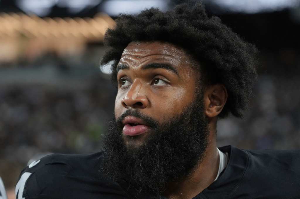 Las Vegas Raiders defensive tackle Christian Wilkins (94) looks on during the first half of an NFL preseason football game against the Dallas Cowboys, Saturday, Aug 17, 2024, in Las Vegas.