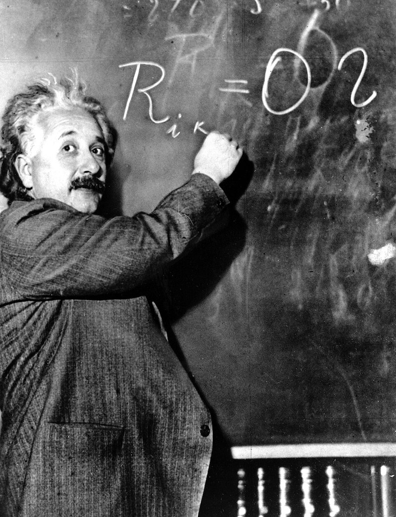 Albert Einstein writes a density formula of the Milky Way on January 14, 1931 on the board of the Carnegie Institute of the Mt. Wilson Observatory in Pasadena, California.