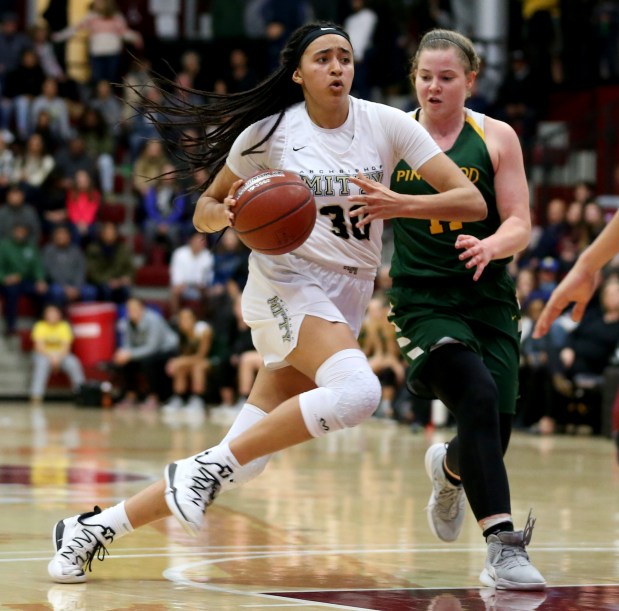 Archbishop Mitty's Haley Jones (30) drives to the basket against Pinewood's Klara Astrom (11) in the fourth period of their Central Coast Section Open Division girls basketball championship game in Santa Clara, Calif., on Friday, Feb. 22, 2019. (Anda Chu/Bay Area News Group)