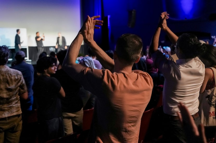 The audience applauds director Francis Ford Coppola after a screening of his movie...