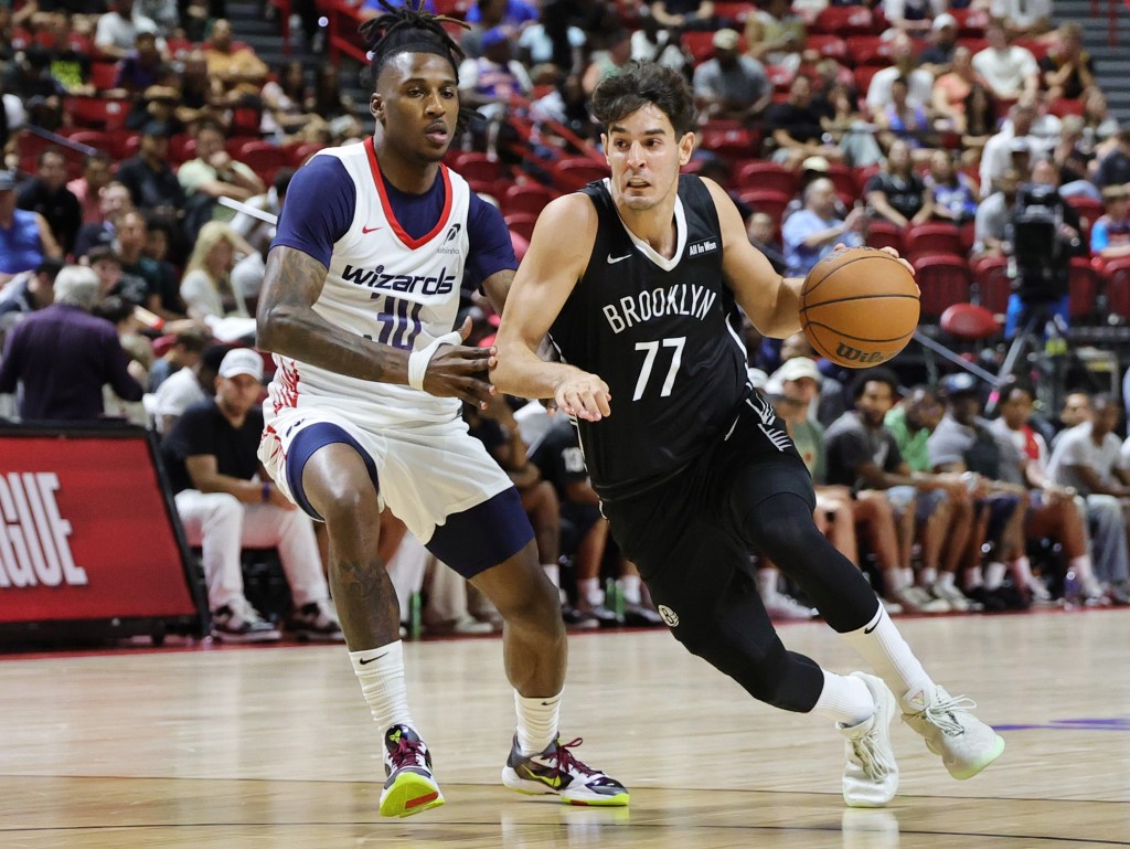Ben Saraf drives to the basket during the Nets' Summer League loss to the Knicks.