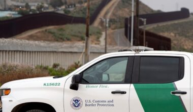 A Border Patrol vehicle sits near border walls separating Tijuana, Mexico, from the United States, Tuesday, June 4, 2024, in San Diego. (AP Photo/Gregory Bull)