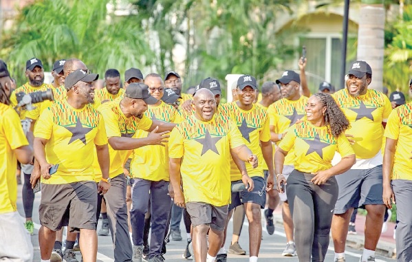 •  Julius Debrah (arrowed), Chief of Staff, participanting in the health walk with the enthusiastic supporters