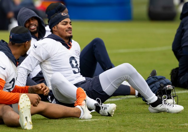 Bears safety Jaquan Brisker stretches May 28, 2025, during OTAs at Halas Hall. (Brian Cassella/Chicago Tribune)
