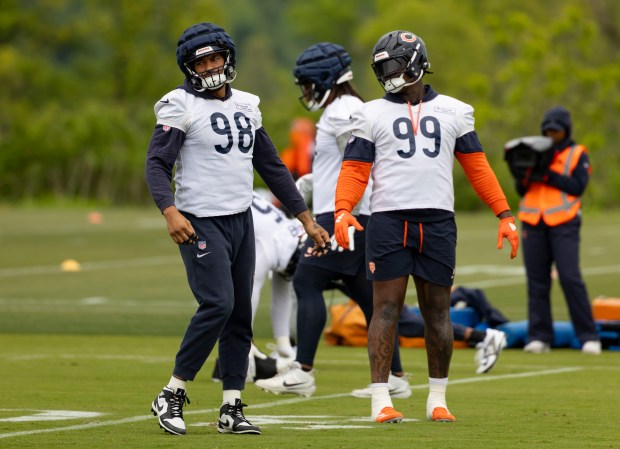 Bears defensive end Montez Sweat (98) and defensive tackle Gervon Dexter Sr. practice Wednesday, May 28, 2025, at Halas Hall. (Brian Cassella/Chicago Tribune)