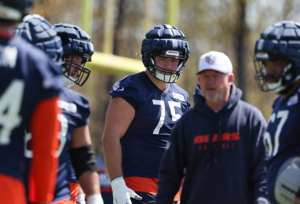 Rookie Ozzy Trapilo (75) listens to instructions during Bears rookie camp at Halas Hall on May 9, 2025, in Lake Forest. (Stacey Wescott/Chicago Tribune)
