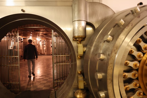 Gary Stoltz, director of design and development at R2 Companies, a private equity real estate firm, walks into a traders' bank vault in the basement of the Chicago Board of Trade Building during a tour on July 1, 2025, in Chicago. (John J. Kim/Chicago Tribune)