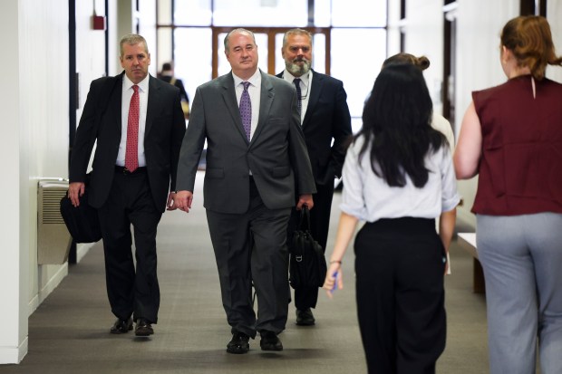 Goldberg Segalla's lead counsel Larry Mason exits the courtroom at Daley Center, July 17, 2025, after a special meeting to discuss his firm's improper use of AI. (Eileen T. Meslar/Chicago Tribune)